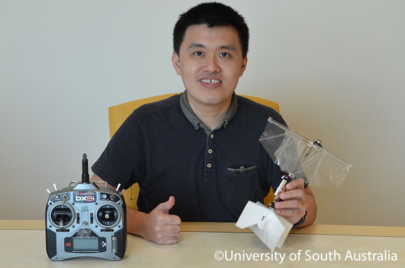 Dr Yao-Wei Chin with drone in hand